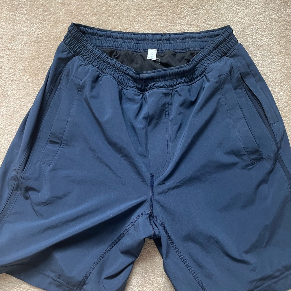 Men’s Lululemon Pacebreaker Shorts, 9” lined. Nautical Navy is the color.